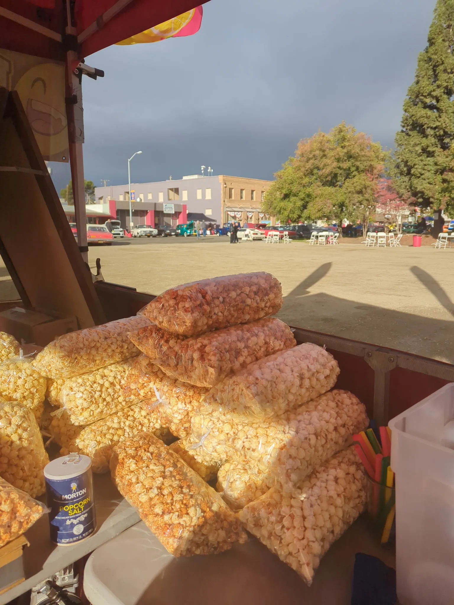 Bags of fresh kettle corn in golden evening light